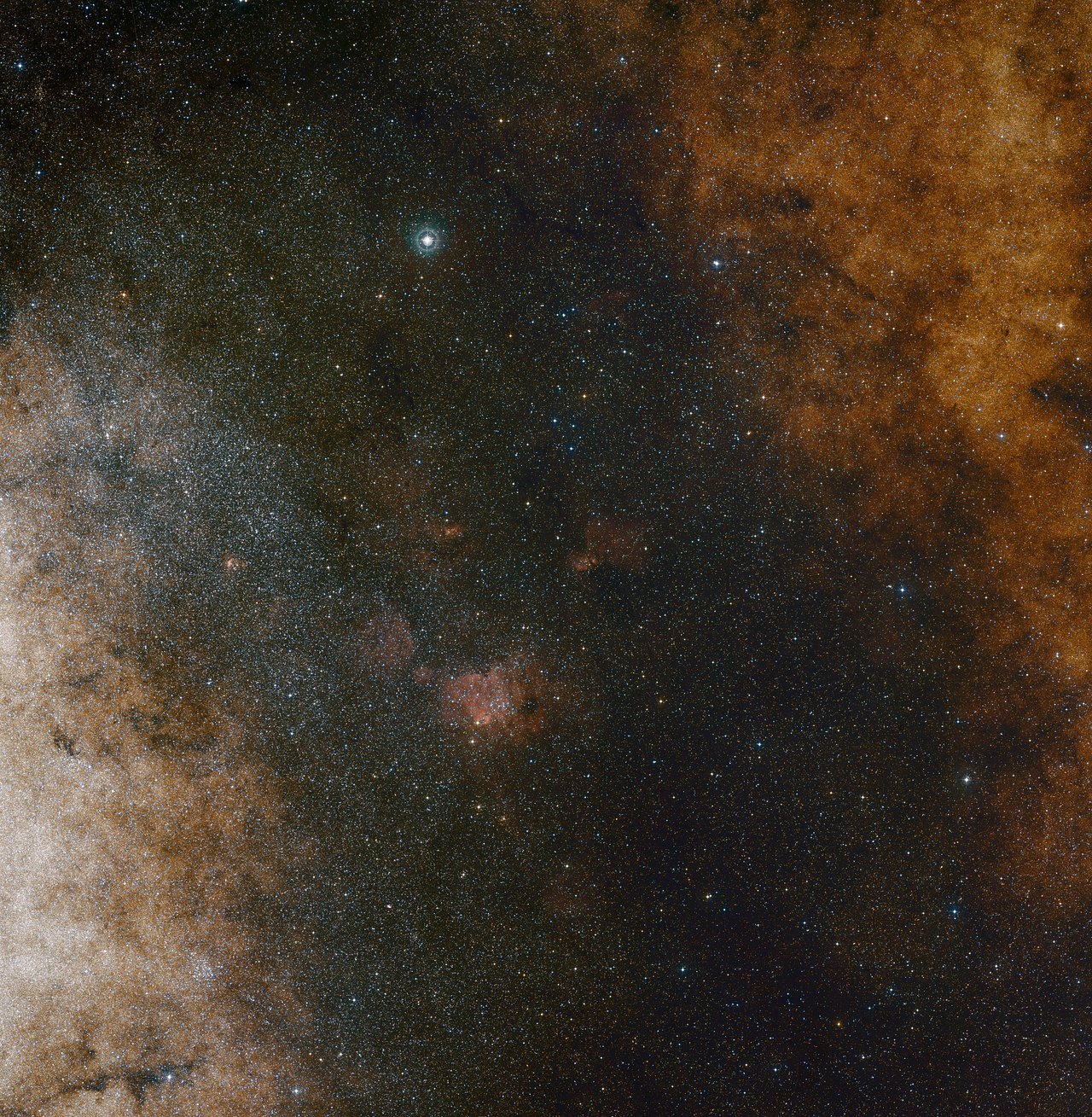 This wide-field view of the center of our Milky Way galaxy shows, in visible light, the vast array of stars contained within this small space. The stars closest to the center of the galaxy, known as S-stars, are orbiting SgrA*, a massive black hole. The orbits of these stars are helping scientists to better understand the black hole and the nature of our galaxy. This view was created from photographs in red and blue light and forming part of the Digitized Sky Survey 2. The field of view is approximately 3.5 degrees x 3.6 degrees.