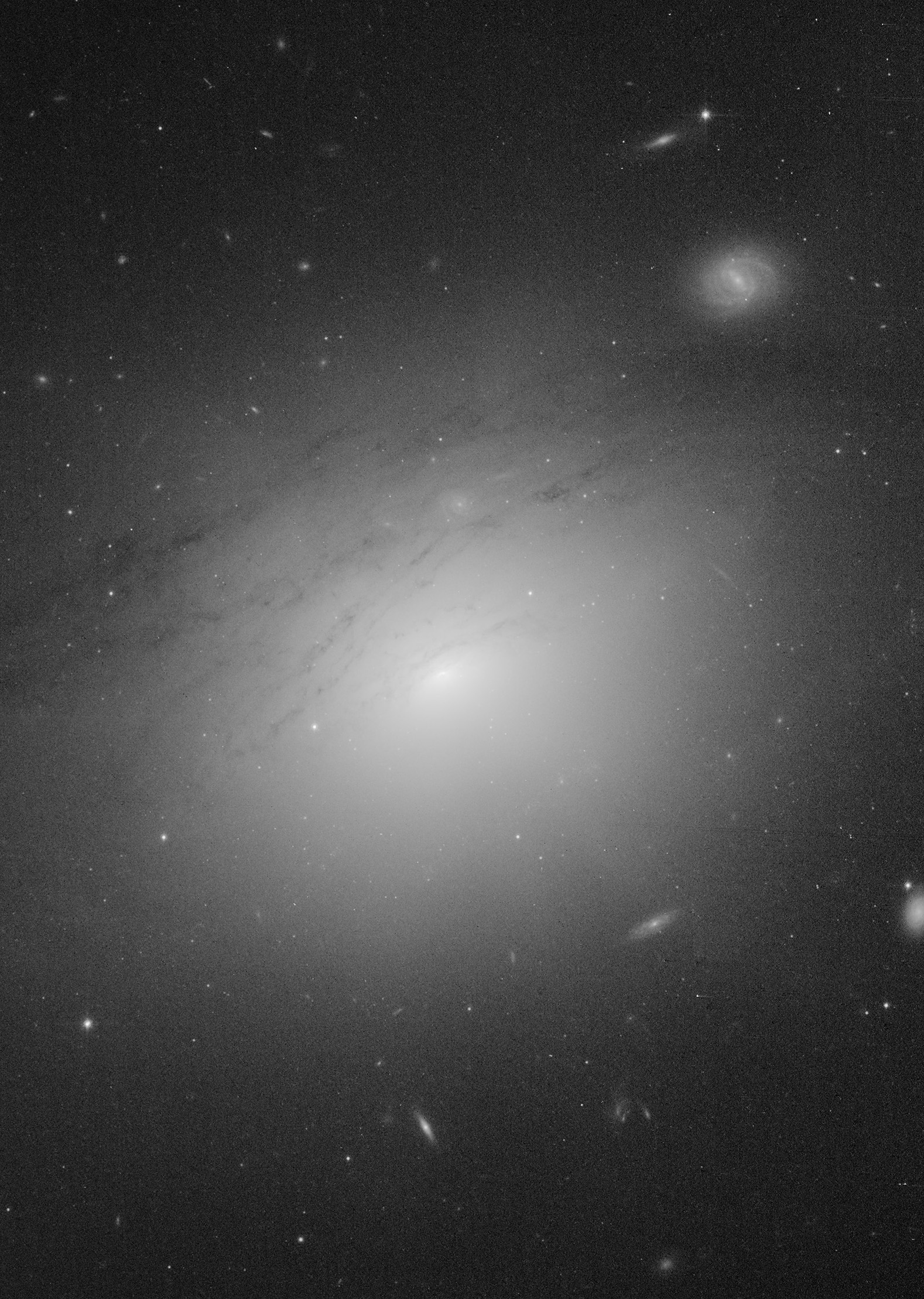 Judy Schmidt, an image processing expert and citizen scientist, processed this image of IC5063--a Seyfert galaxy with an active galactic nuclei--from Barth's Prop15444 and discovered what looked like dark shadows or cones pointing inward towards the center of the galaxy.