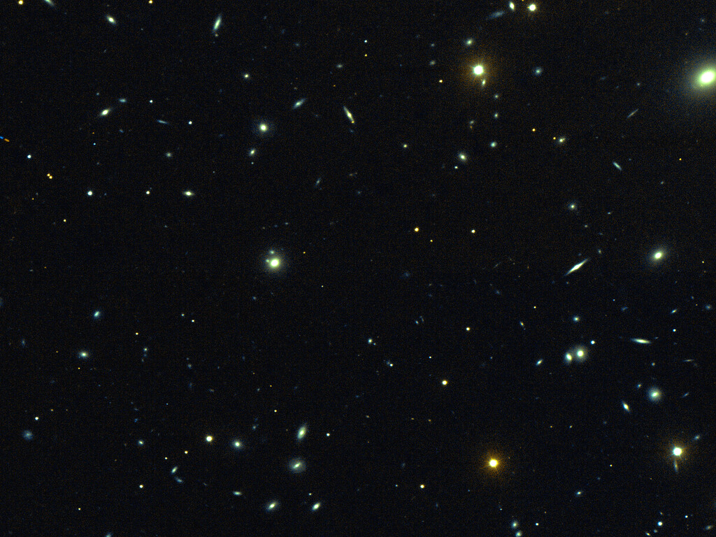 Galaxy cluster Abell 98 in a colour composite derived from R and I images. Data taken at the 3.5-meter WIYN telescope on Kitt Peak by Mike Pierce, Indiana University. 