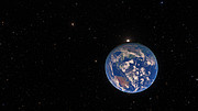 A video of the viewer in space passing earth until we come upon a large star with another smaller object orbiting it.