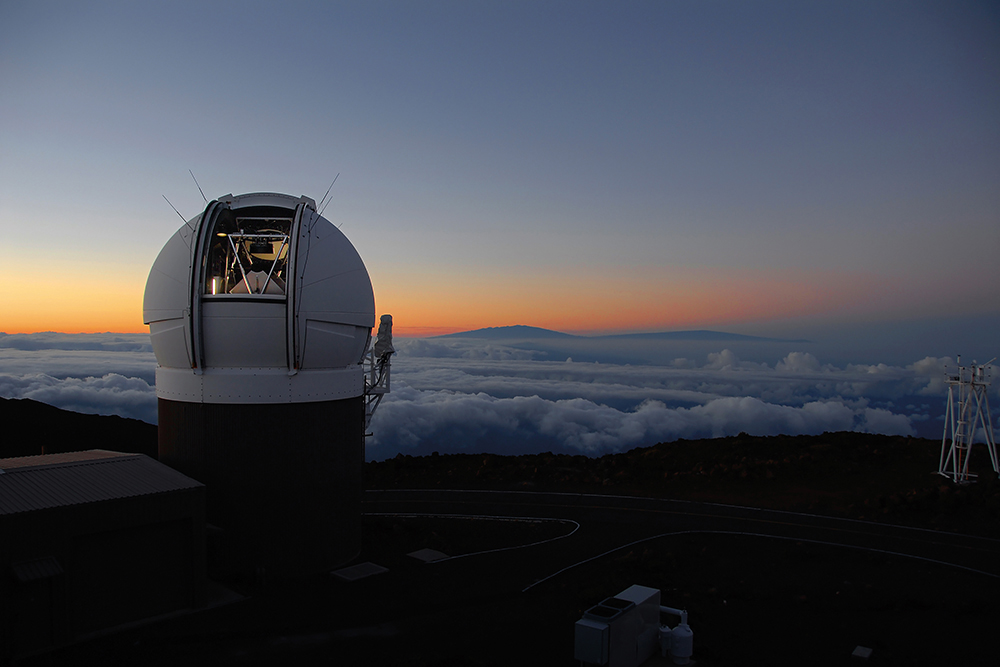 The Pan-STARRS1 Observatory on Halealakala, Maui, opens at sunset to begin a night of mapping the sky.