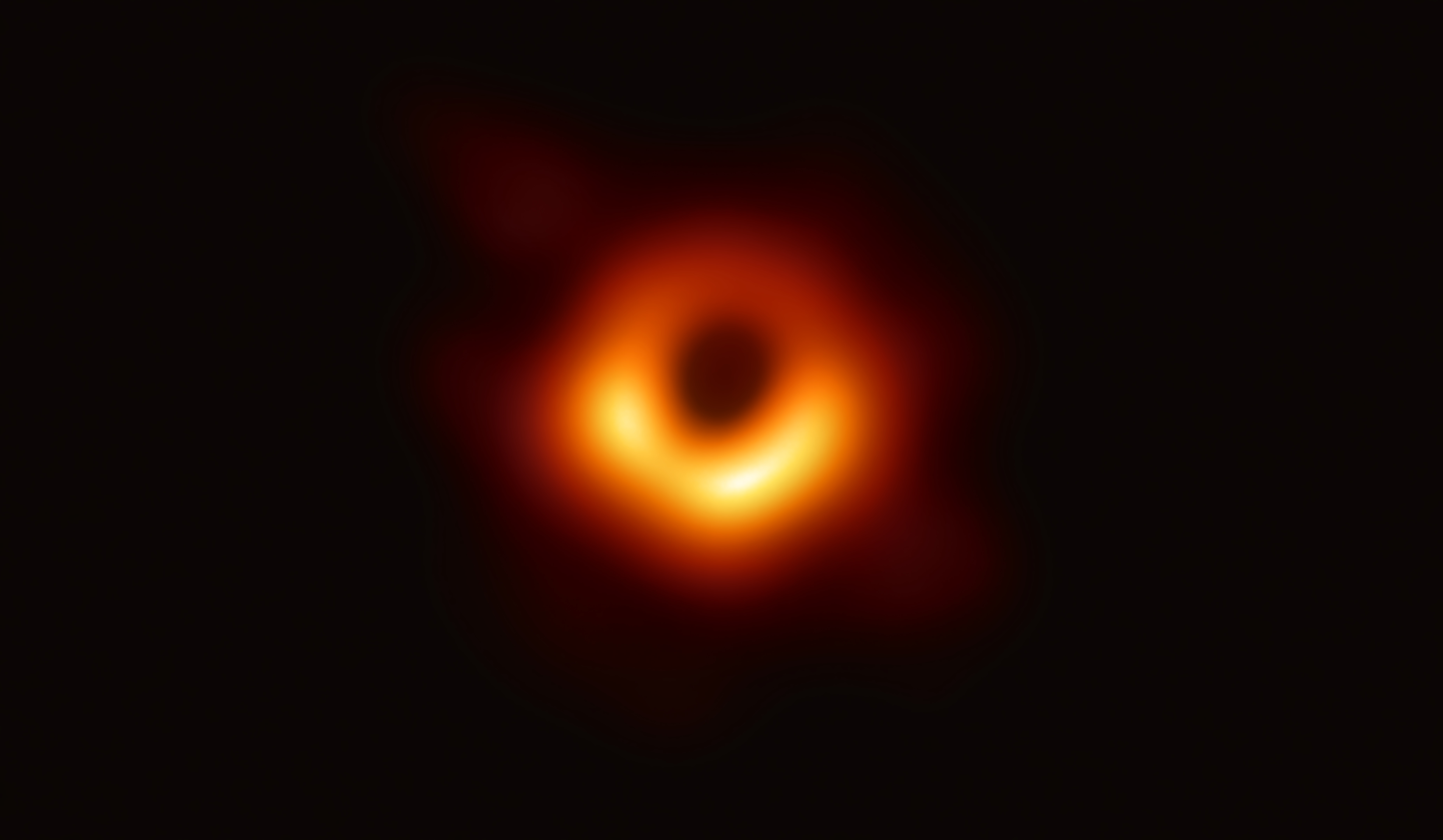 Using the Event Horizon Telescope, scientists obtained an image of the black hole at the center of the galaxy M87. The black hole is outlined by emission from hot gas swirling around it under the influence of strong gravity near its event horizon. This is the first picture of a black hole.