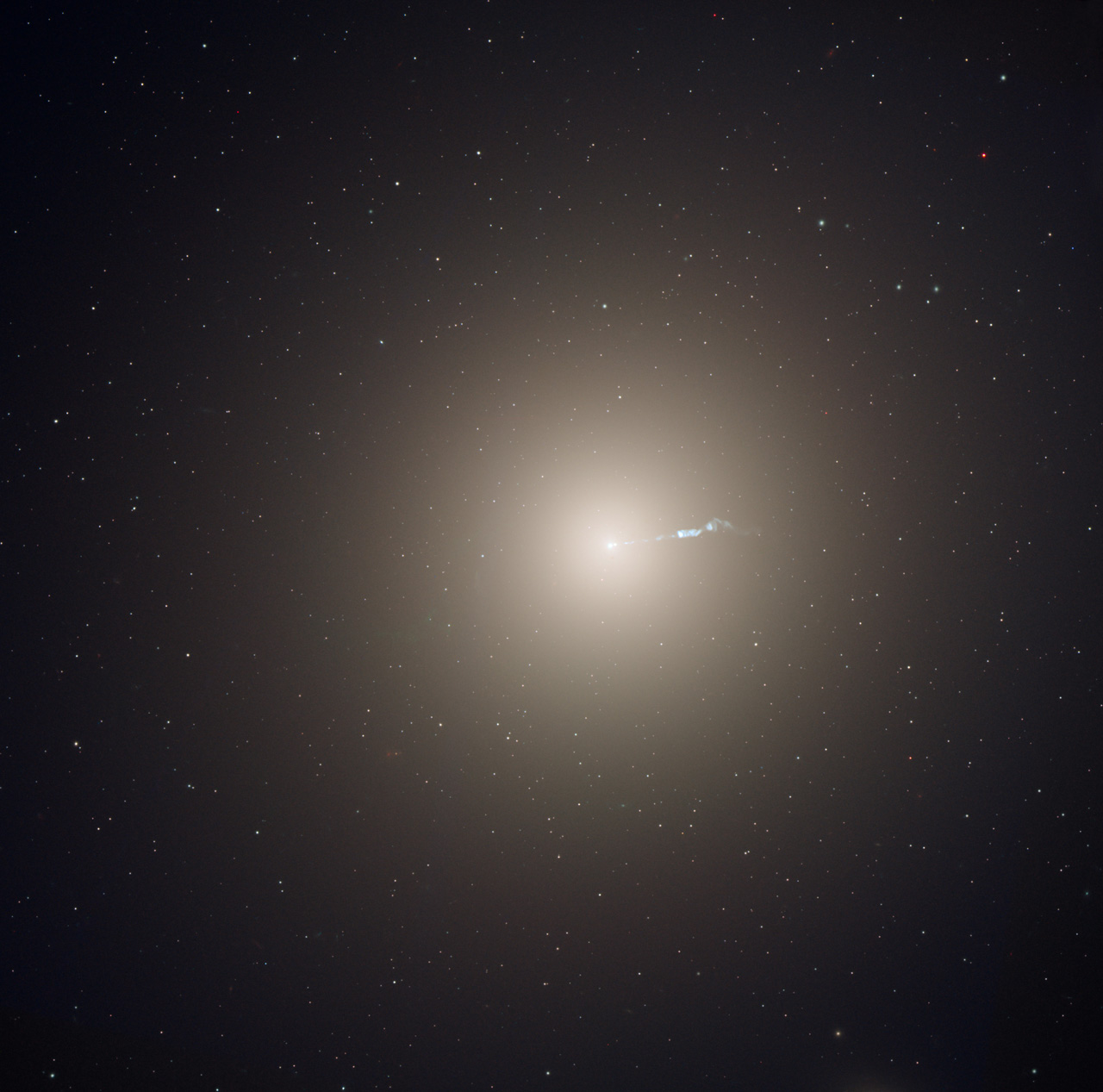 The monstrous elliptical galaxy M87, located 53 million light-years from Earth is the dominant galaxy at the center of the neighboring Virgo cluster of galaxies. Astronomers have measured the &quot;heartbeats&quot; of stars within M87 and used that data to determine the galaxy&#039;s age in a new way. This photograph was taken with the Hubble Space Telescope&#039;s Advanced Camera for Surveys instrument.
