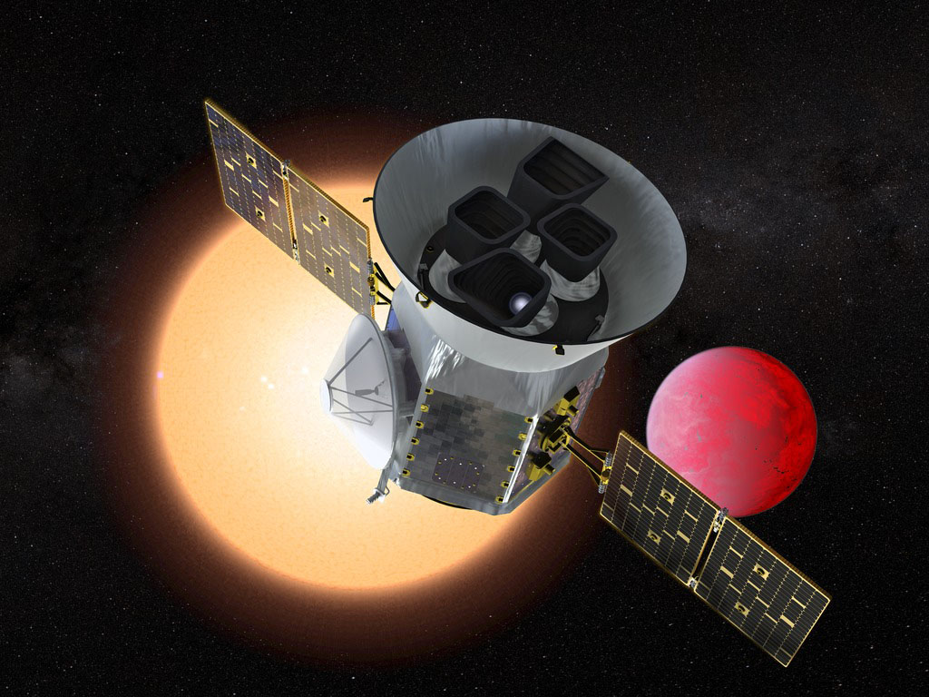 Illustration of the Transiting Exoplanet Survey Satellite (TESS) in front of a lava planet orbiting its host star. TESS will identify thousands of potential new planets for further study and observation.