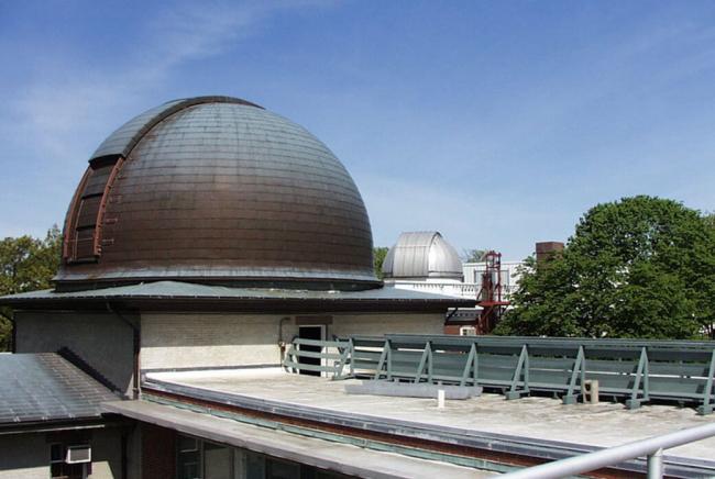 Two observatory domes on the roof of CfA Headquarters in Cambridge, Massachusetts