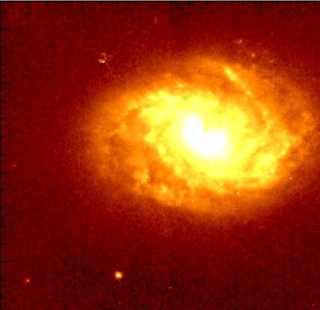 A near-infrared Hubble image of the luminous, barred spiral galaxy ESO320-G030