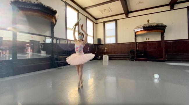 Astrophysics student Xiaohan Wu uses a choreographed ballet dance to explain the physics behind the early universe.
