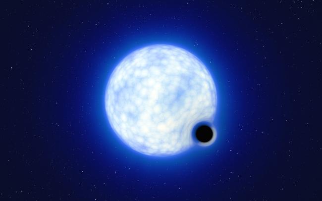 This artist’s impression shows what the binary system VFTS 243 might look like if we were observing it up close. 
