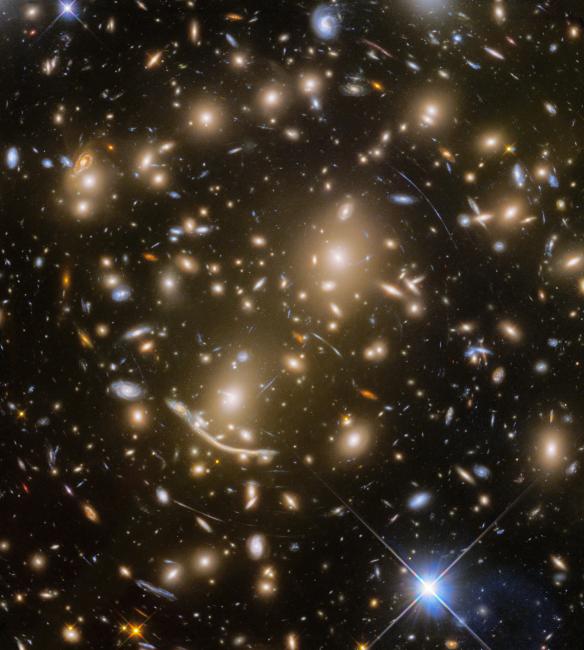 Abell 370, a galaxy cluster located nearly 4 billion light-years away from Earth