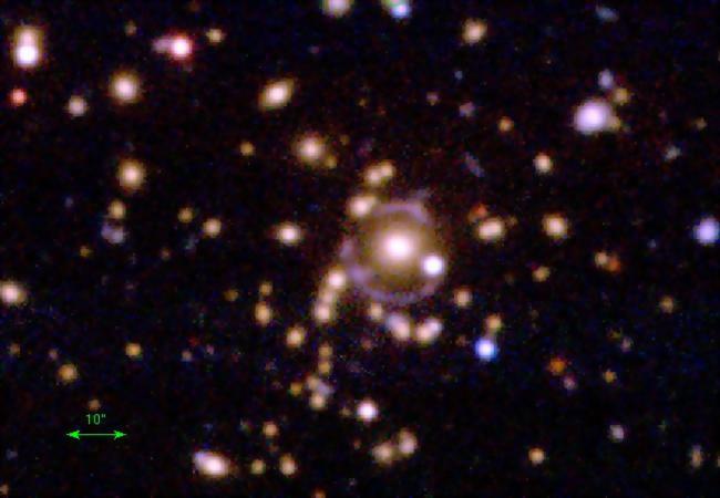 A Serendipitous Gravitational Lens